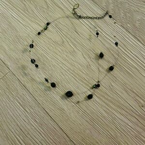 Robert Rose invisible floating Choker necklace with black metallic glass beads